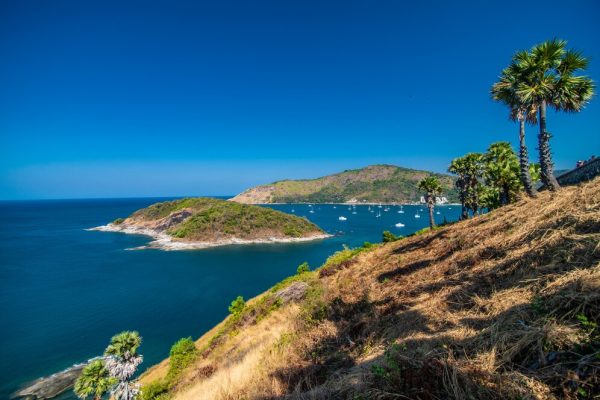 view-rocky-cliffs-clear-sea-bright-sun-promthep-cape-viewpoint-phuket-thailand_231208-1447[1]
